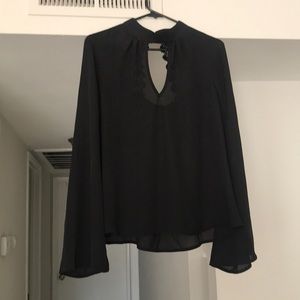 Black blouse tags on